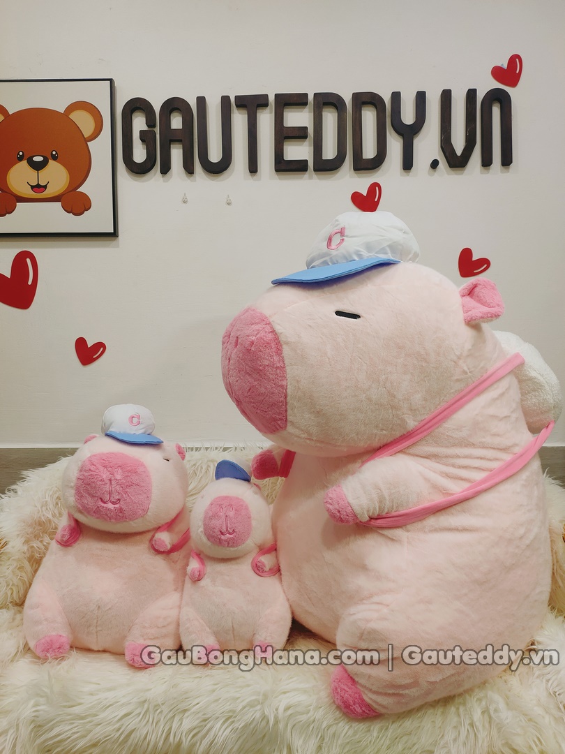 Chuột Capybara Hồng Đội Nón Đeo Balo